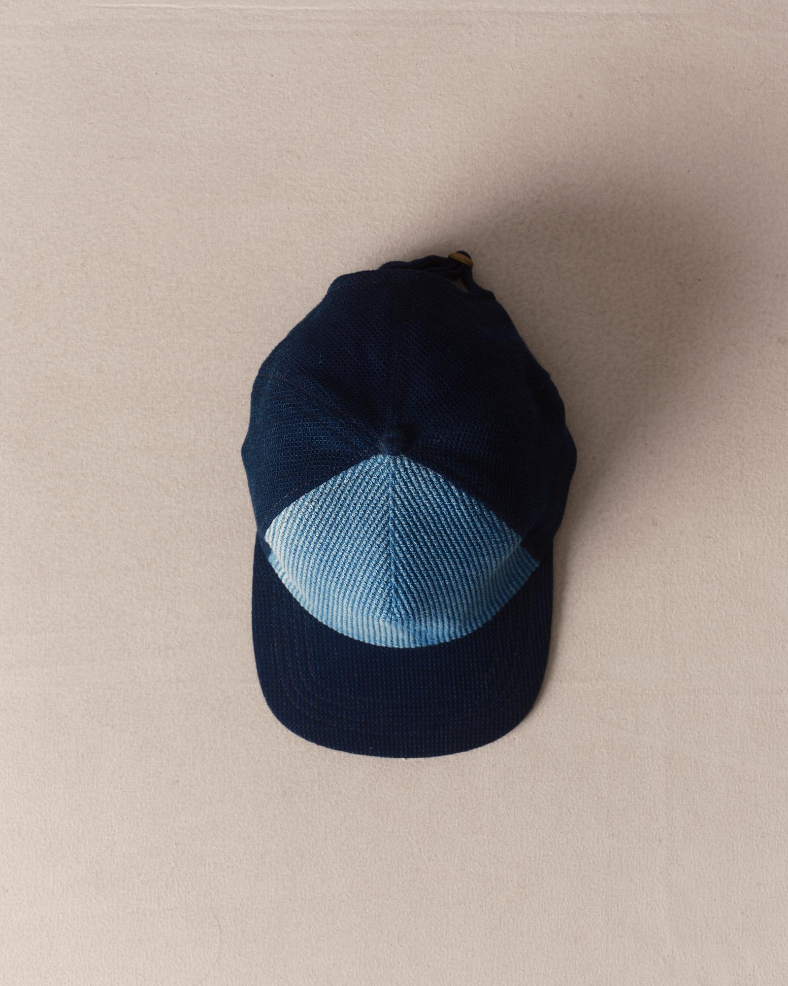 editorial image of The Taylor Stitch x Hypeadelic Cap v2.09 hanging