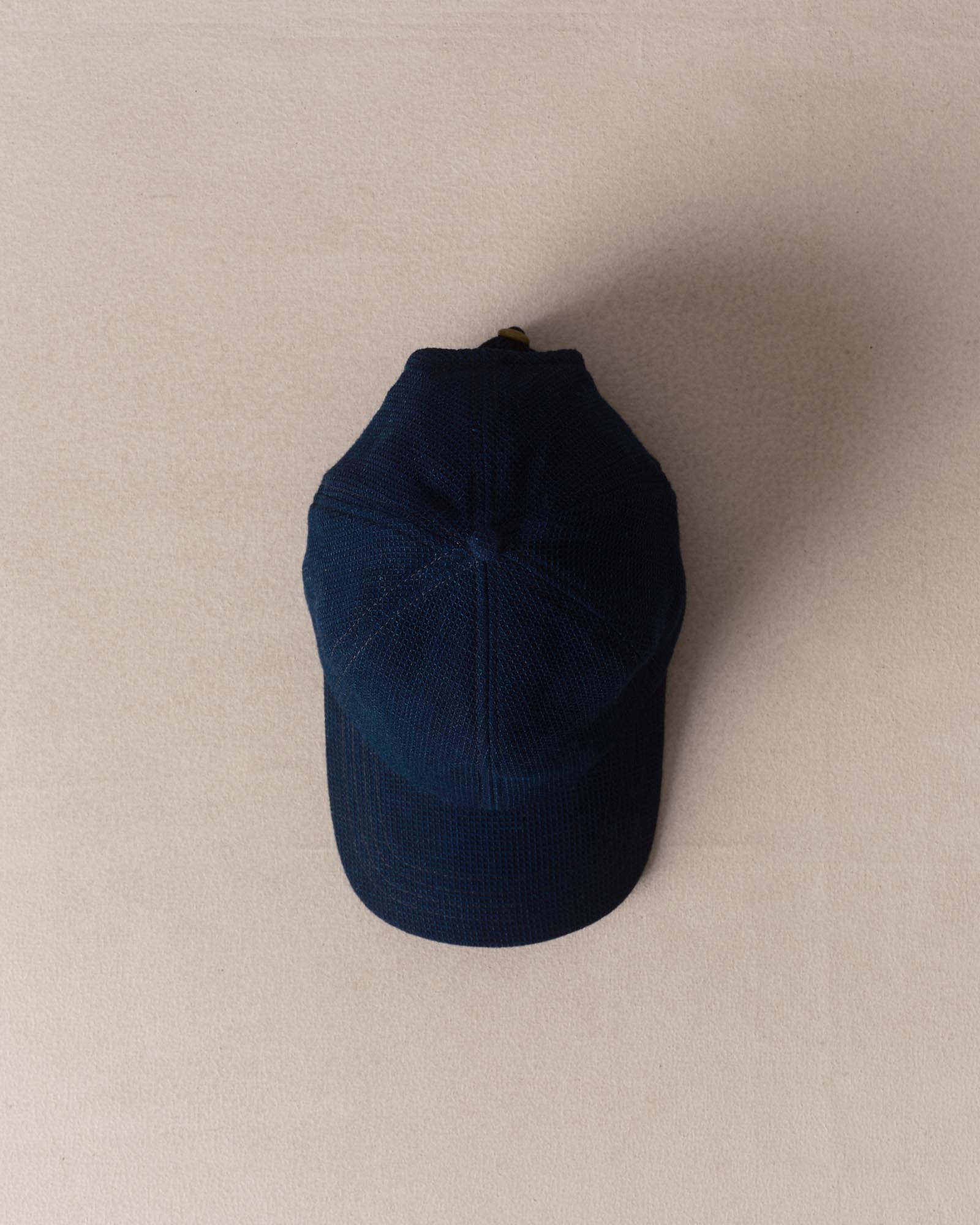 editorial image of The Taylor Stitch x Hypeadelic Cap v2.10 hanging