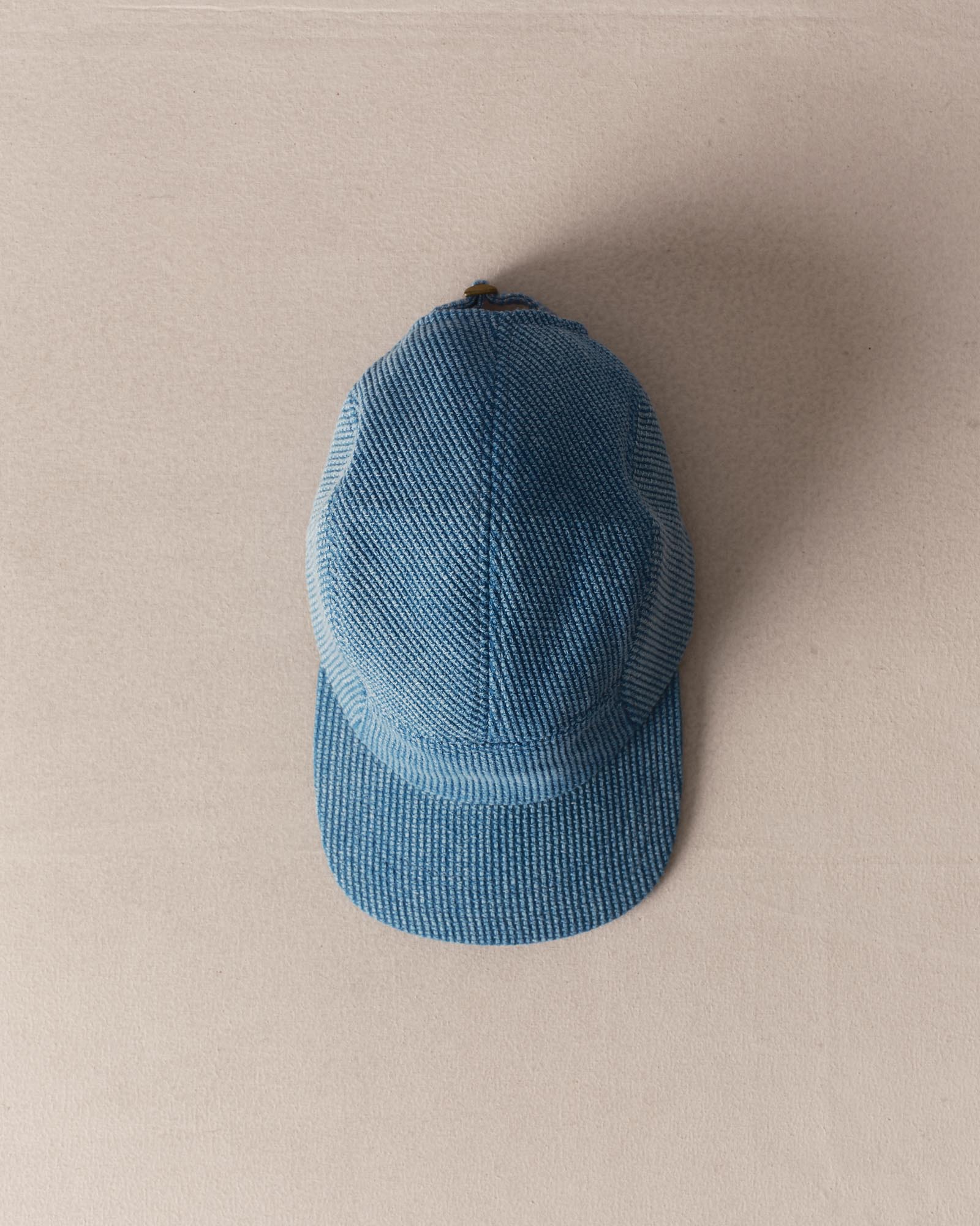 editorial image of The Taylor Stitch x Hypeadelic Cap v2.12 hanging