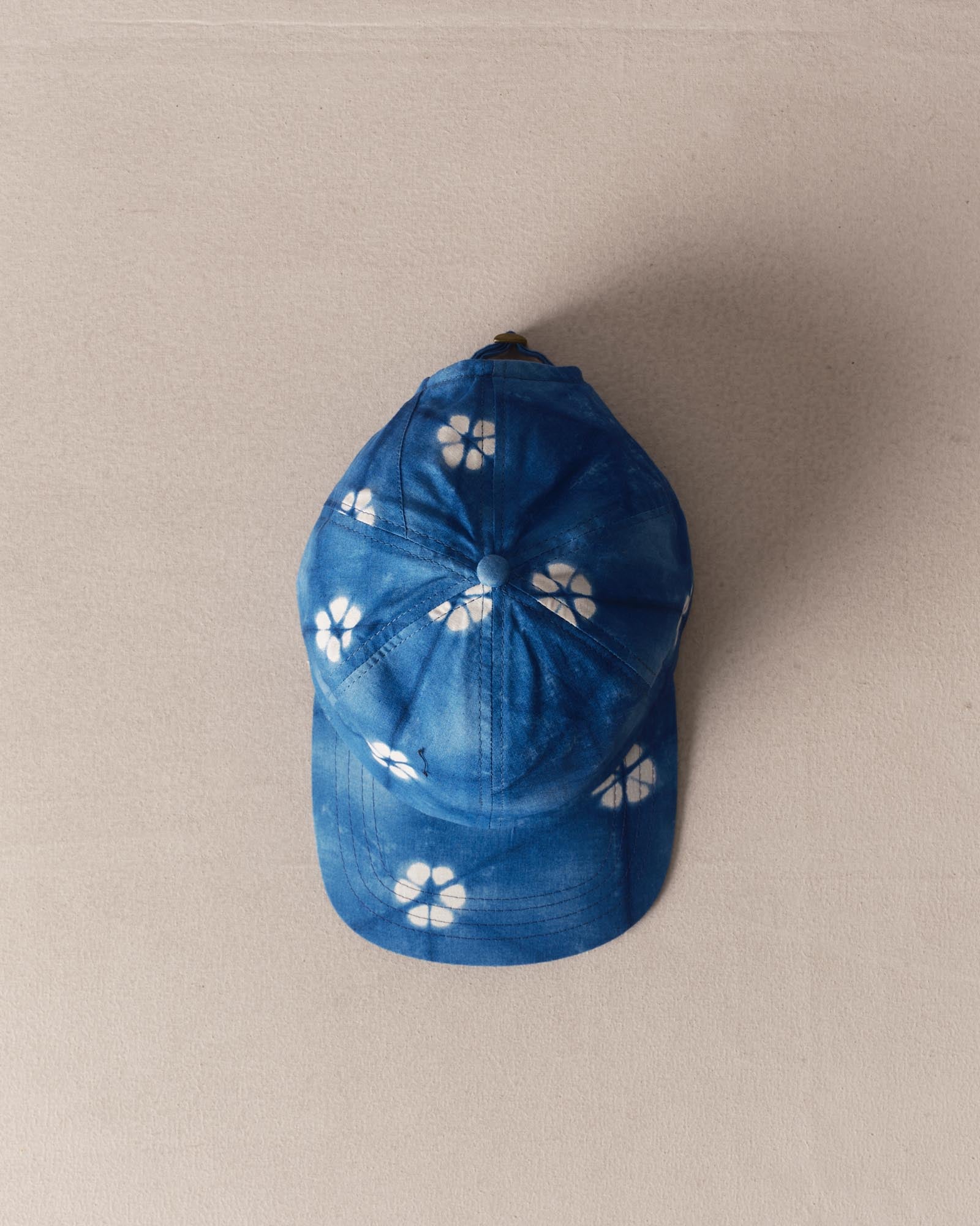 editorial image of The Taylor Stitch x Hypeadelic Cap v2.15 hanging
