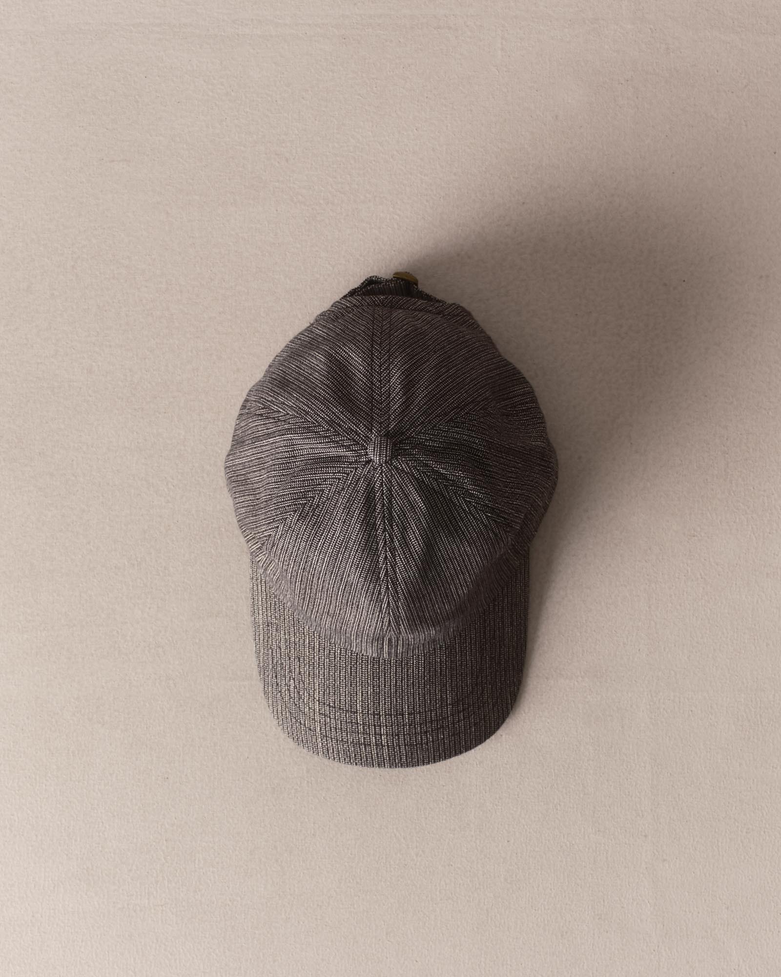 editorial image of The Taylor Stitch x Hypeadelic Cap v2.17 hanging