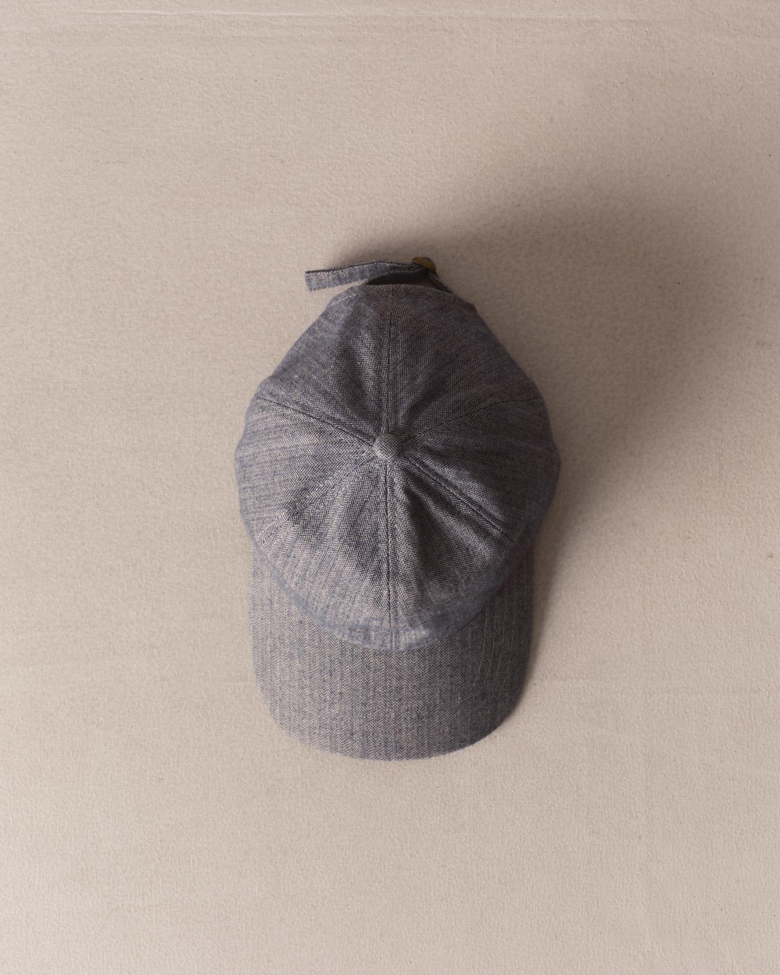editorial image of The Taylor Stitch x Hypeadelic Cap v2.18 hanging