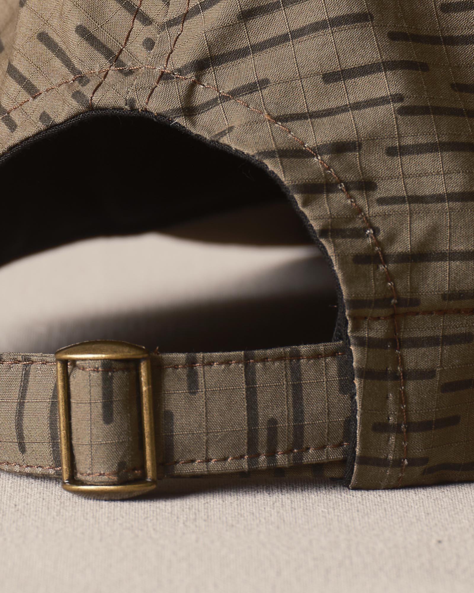 material shot of the strap on The Taylor Stitch x Hypeadelic Cap v2.28