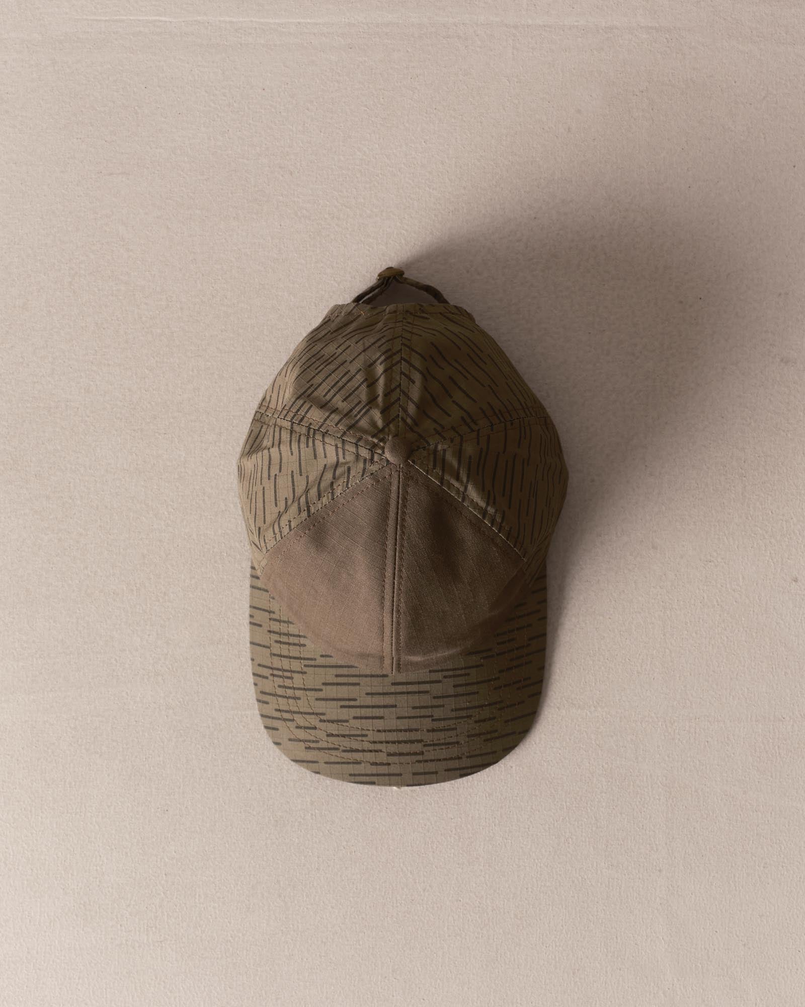 editorial image of The Taylor Stitch x Hypeadelic Cap v2.28 hangng