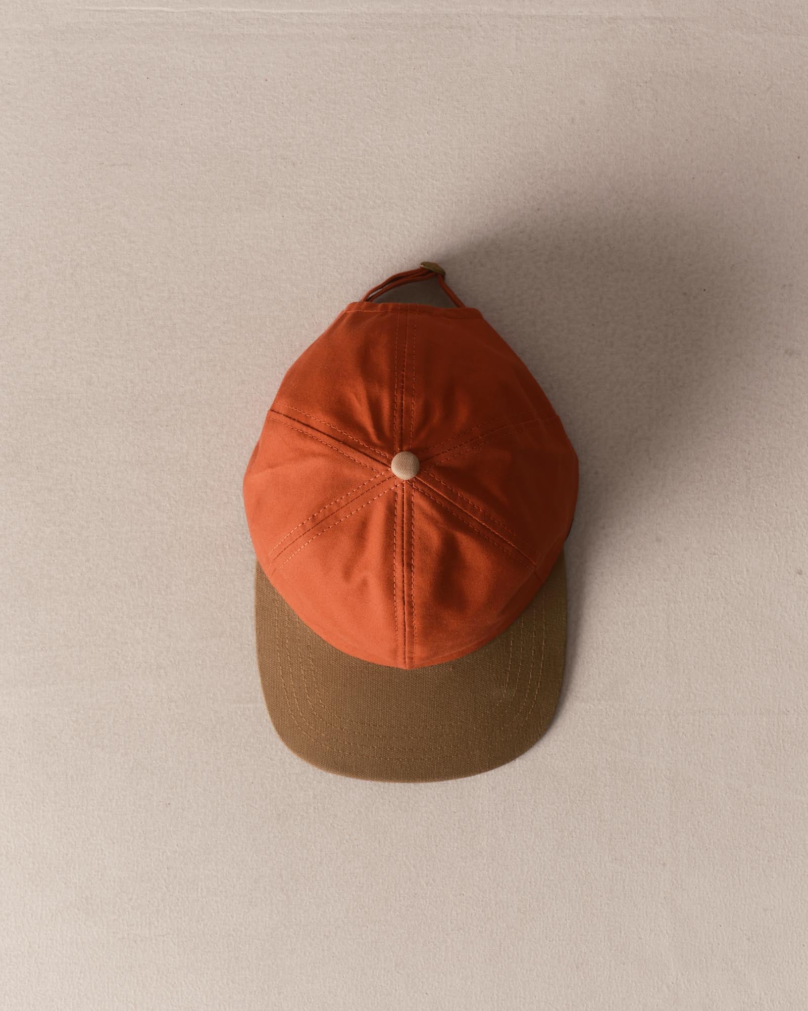 editorial image of The Taylor Stitch x Hypeadelic Cap v2.45 hanging