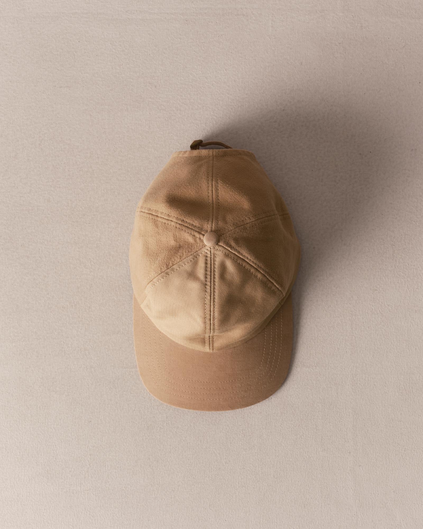 editorial image of The Taylor Stitch x Hypeadelic Cap v2.46 hanging