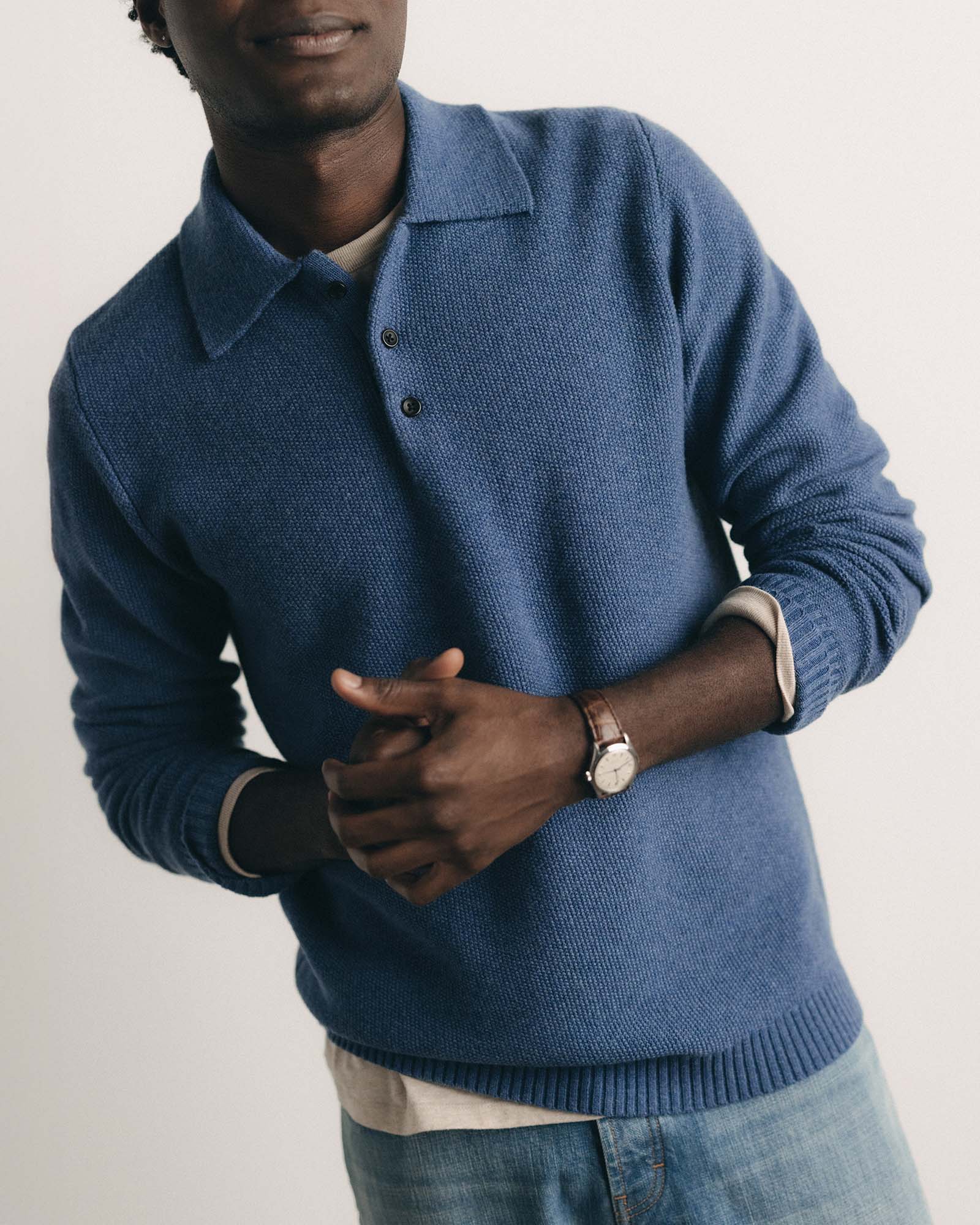 fit model posing in The Newton Sweater Polo in Heather Clear Blue, Knits by Taylor Stitch