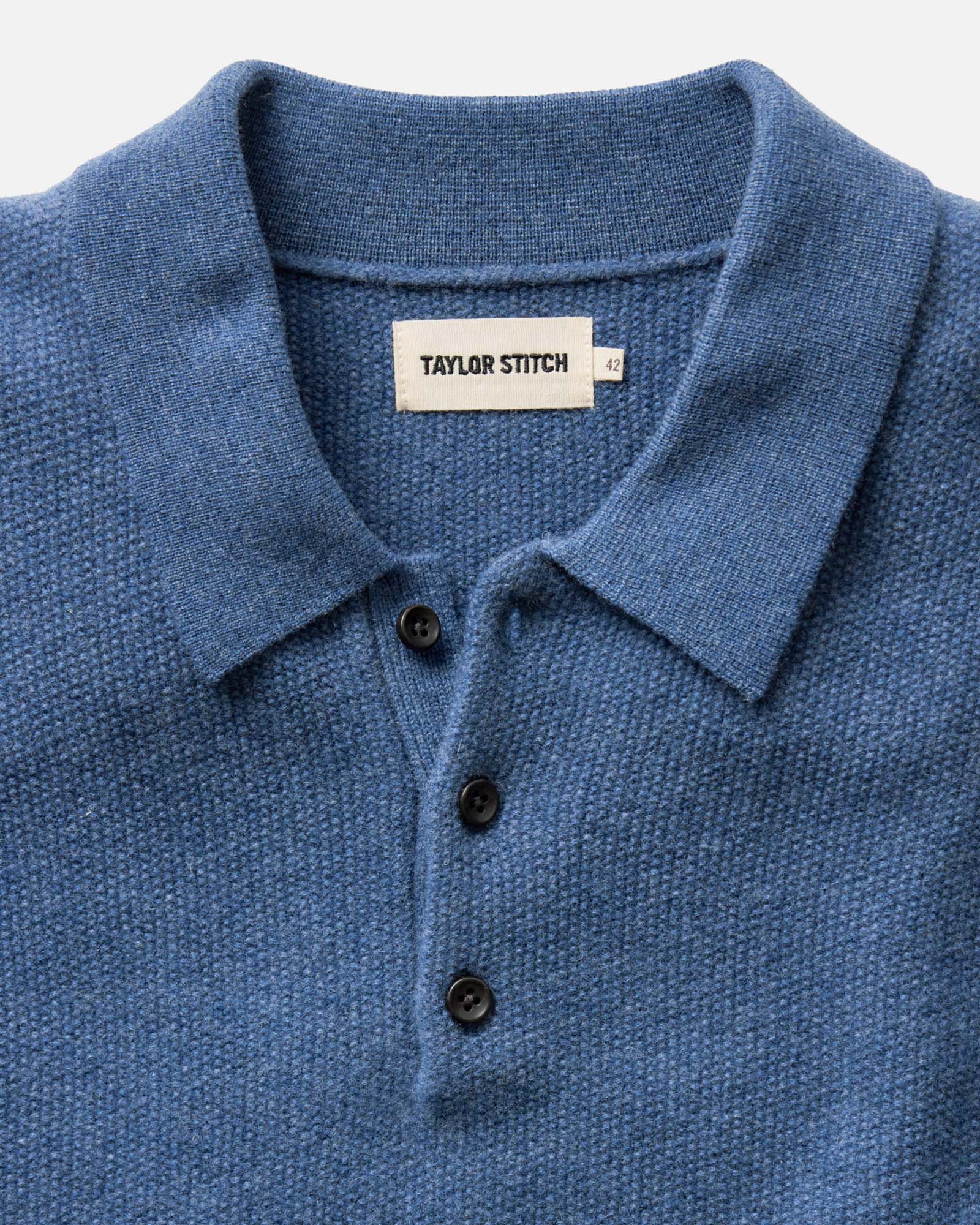 material shot of the collar on The Newton Sweater Polo in Heather Clear Blue, Knits by Taylor Stitch