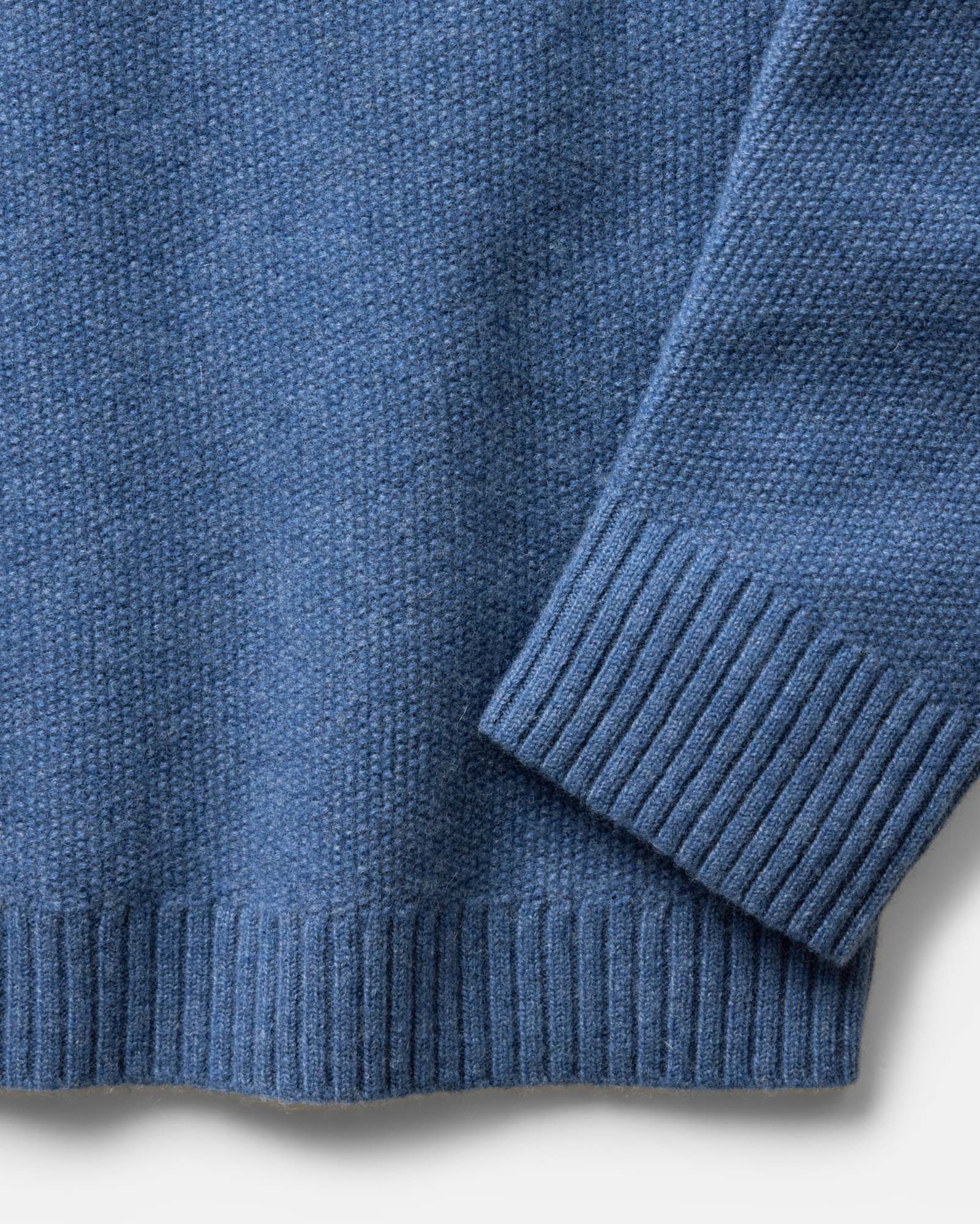 material shot of the sleeve on The Newton Sweater Polo in Heather Clear Blue, Knits by Taylor Stitch