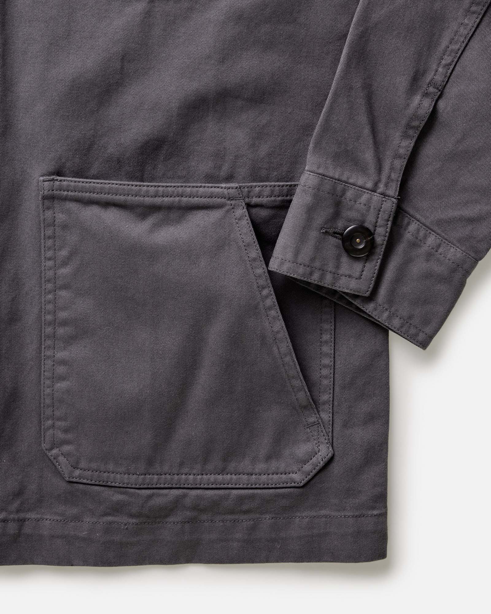 flatlay of The Ojai Jacket in Organic Charcoal Foundation Twill, shown from the back, Outerwear by Taylor Stitch