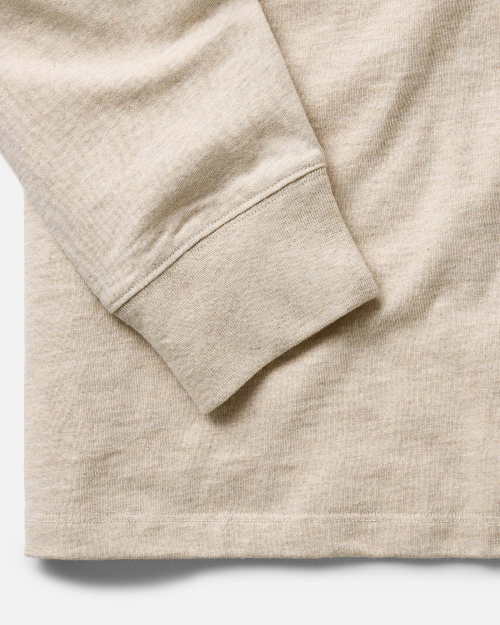 material shot of the sleeve on The Organic Cotton Long Sleeve Tee in Heather Oat, Knits by Taylor Stitch
