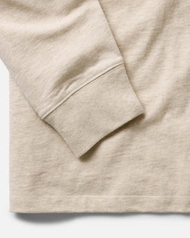 material shot of the sleeve on The Organic Cotton Long Sleeve Tee in Heather Oat, Knits by Taylor Stitch