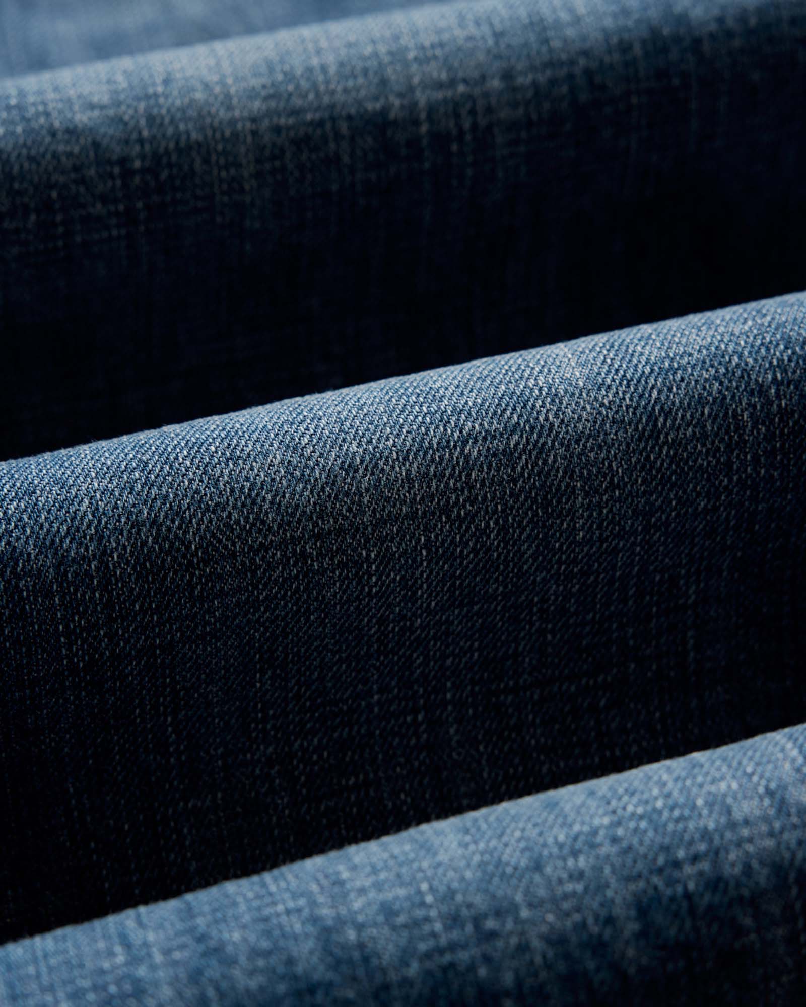 material shot of the waistband on The Slim Jean in Mid Wash Organic Selvedge, Bottoms by Taylor Stitch