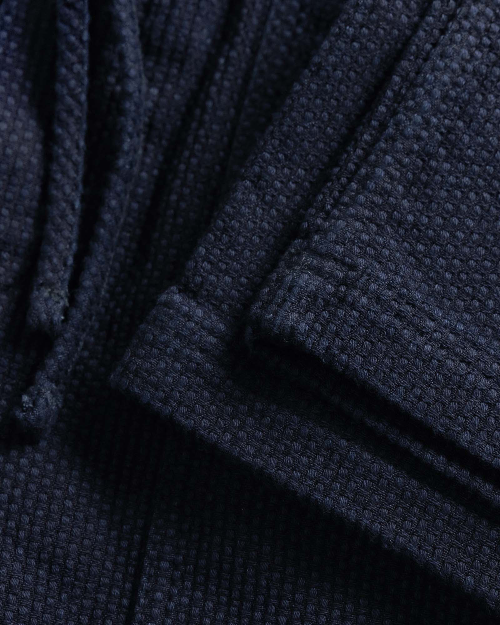 material shot of the hem on The Breakwater Pant in Rinsed Indigo Sashiko, Bottoms by Taylor Stitch