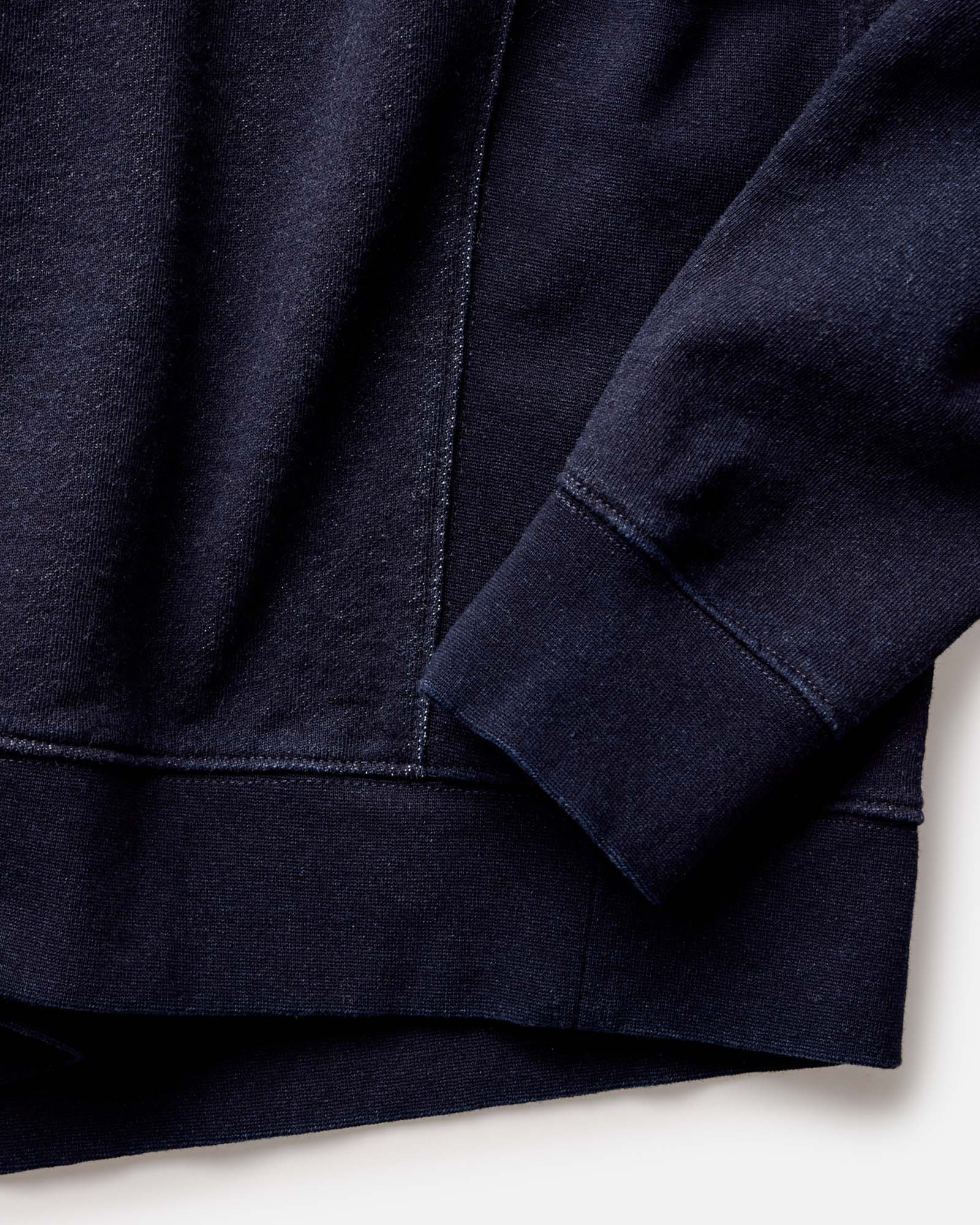 fit model carrying a tote in The Apres Crew in Indigo Terry, Knits by Taylor Stitch