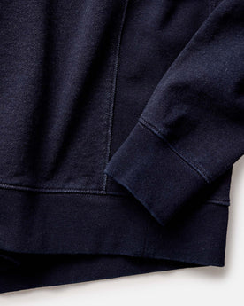 fit model carrying a tote in The Apres Crew in Indigo Terry, Knits by Taylor Stitch