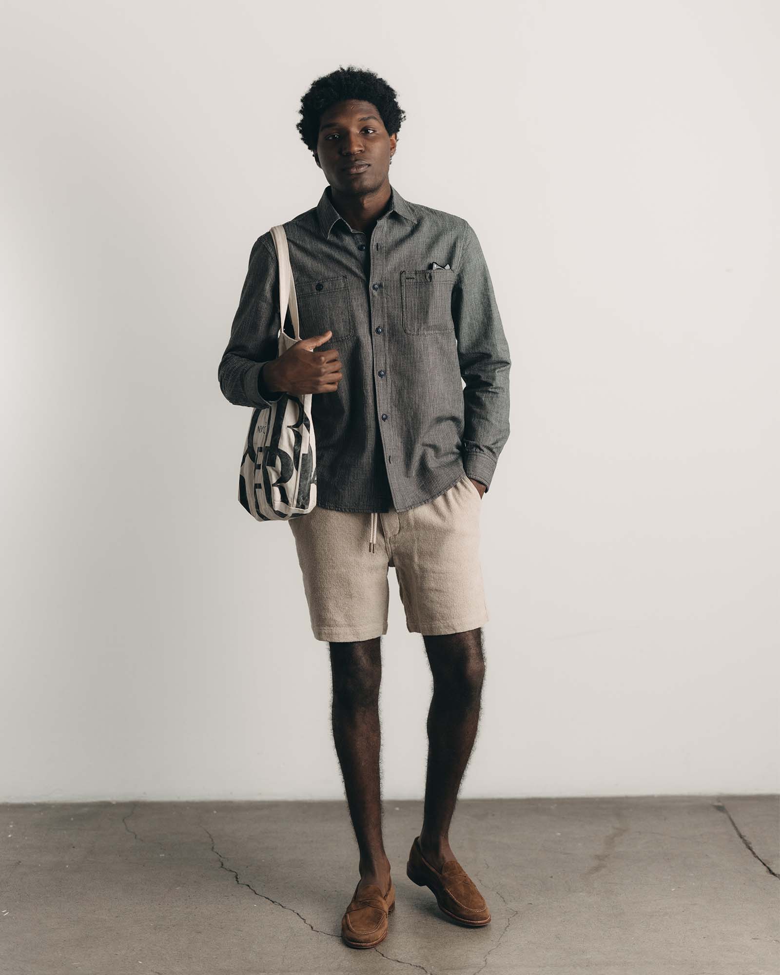 fit model showing off The Apres Short in Heather Oat Crepe, Bottoms by Taylor Stitch