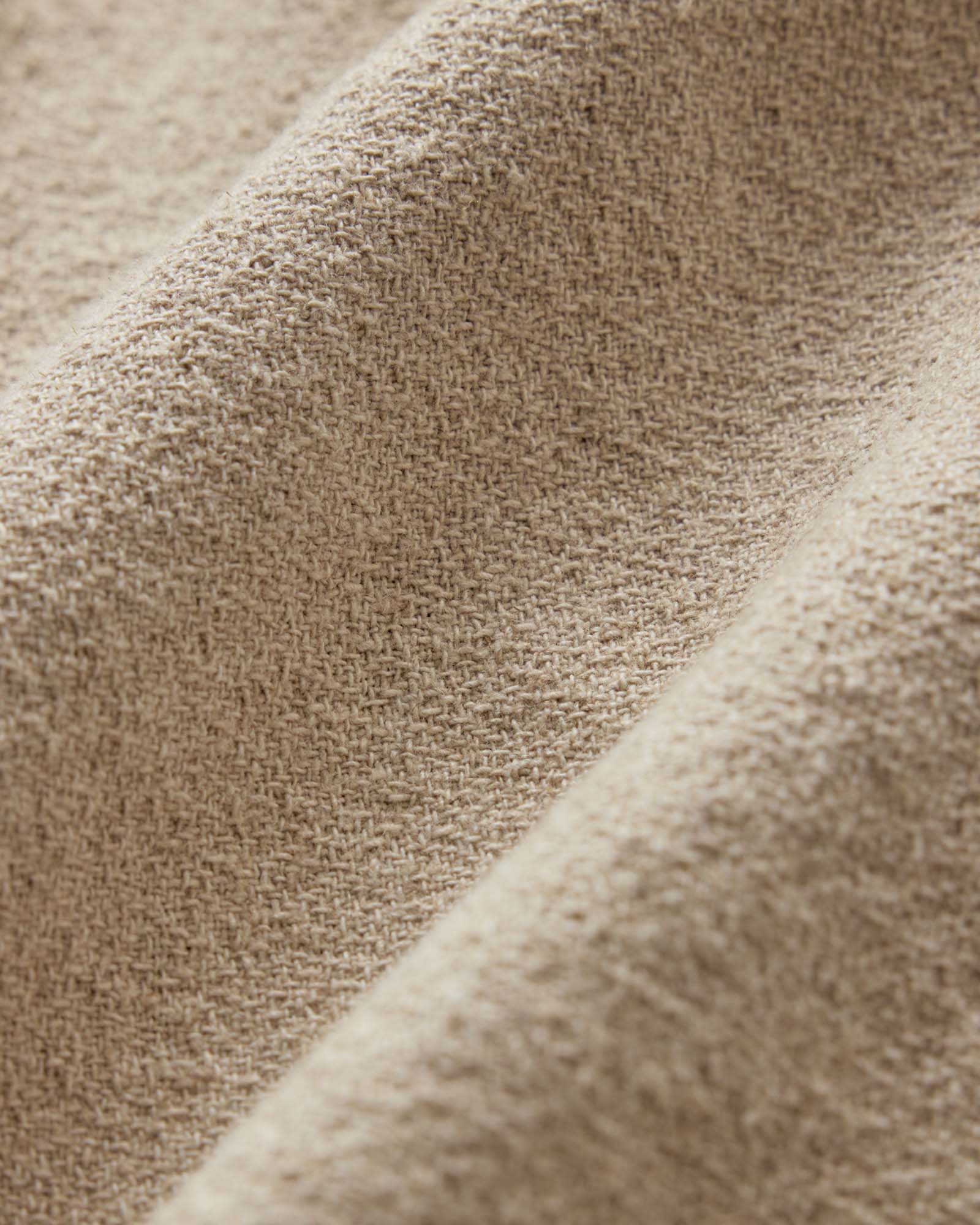 material shot of the fabric on The Apres Short in Heather Oat Crepe, Bottoms by Taylor Stitch