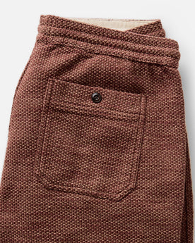 material shot of the back pocket on The Breakwater Pant in Black Cherry Sashiko, Bottoms by Taylor Stitch