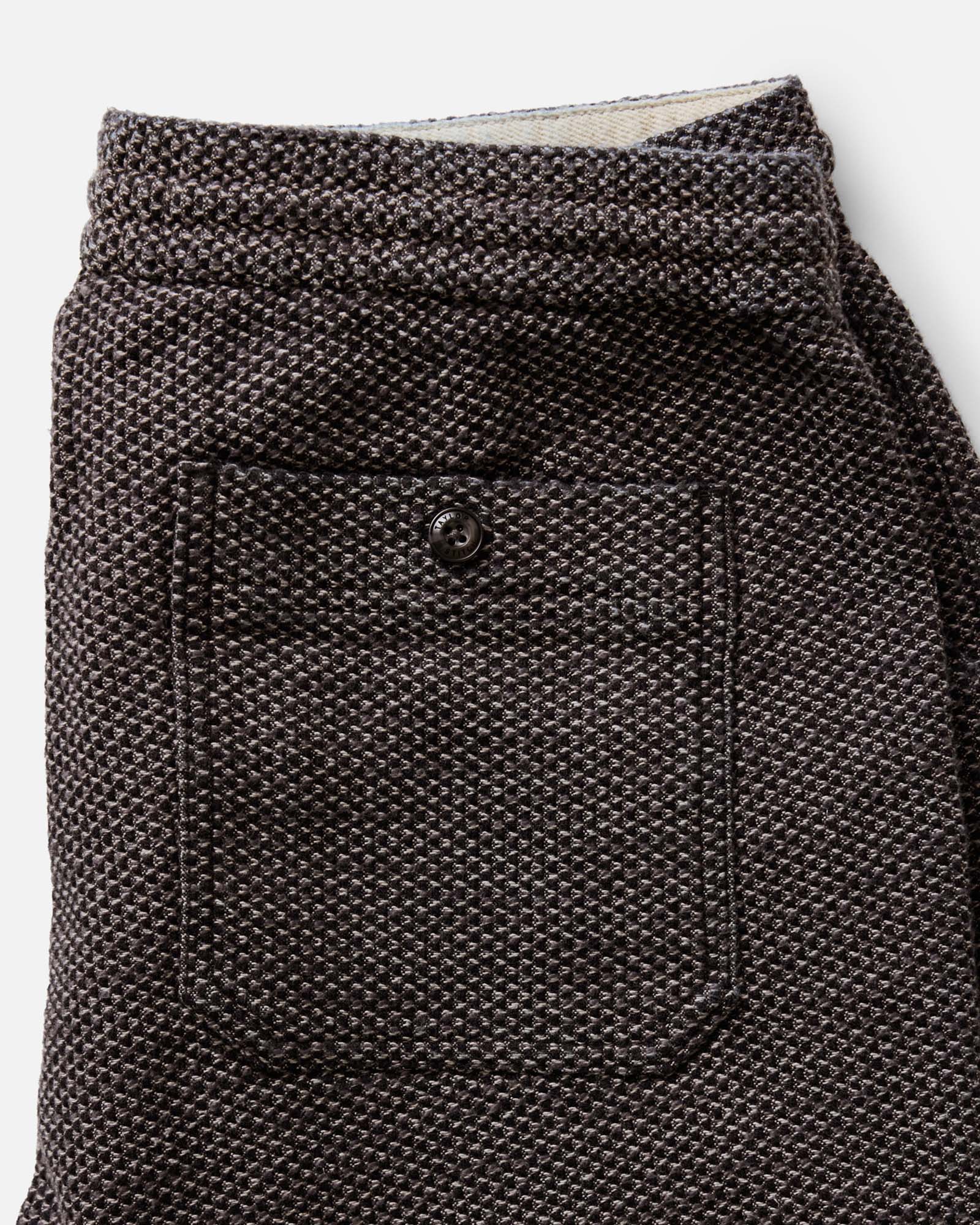 material shot of the back pocket on The Breakwater Pant in Charcoal Sashiko, Bottoms by Taylor Stitch