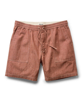 flatlay of The Breakwater Short in Brick Chambray, Bottoms by Taylor Stitch