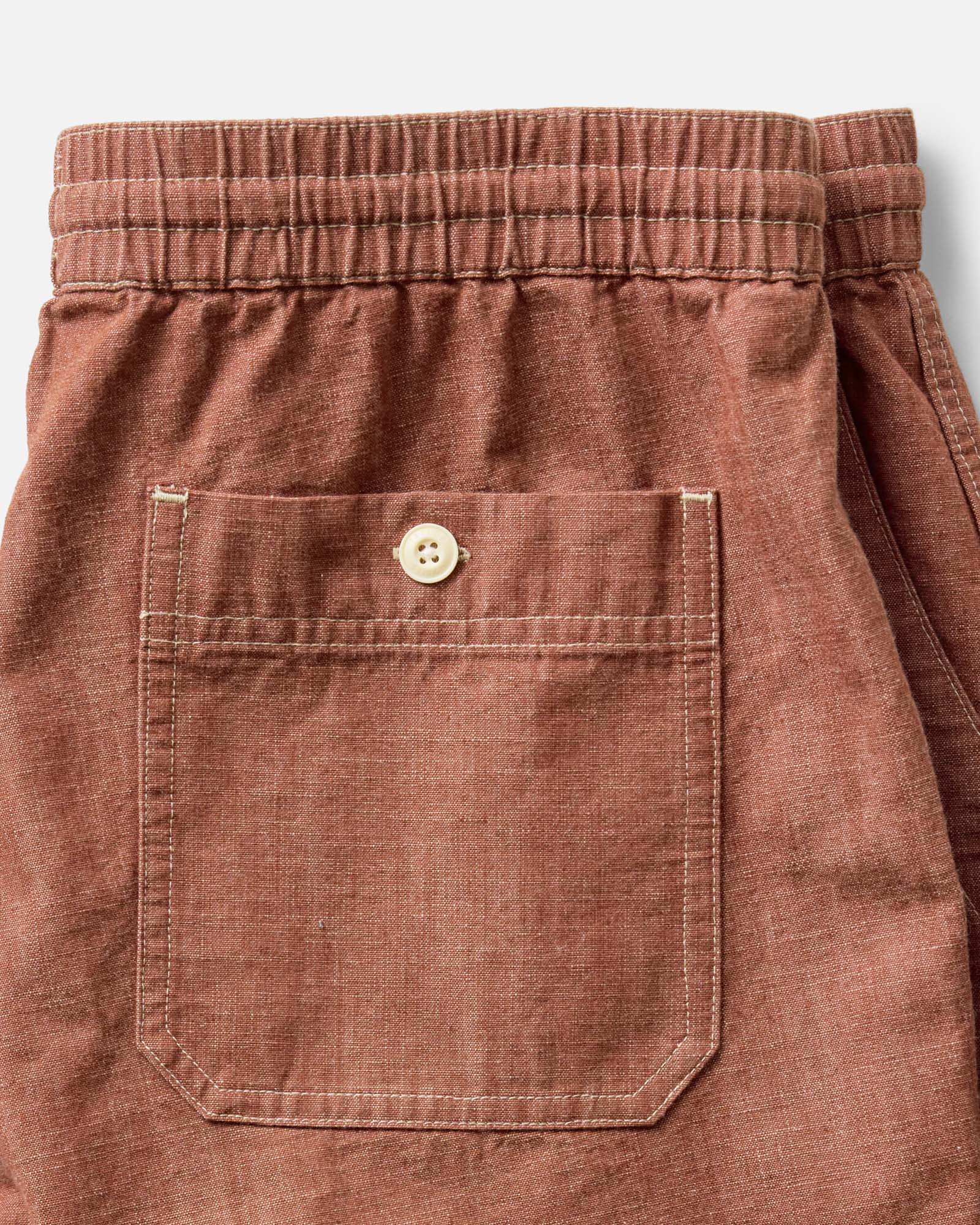 material shot of the pocket on The Breakwater Short in Brick Chambray, Bottoms by Taylor Stitch