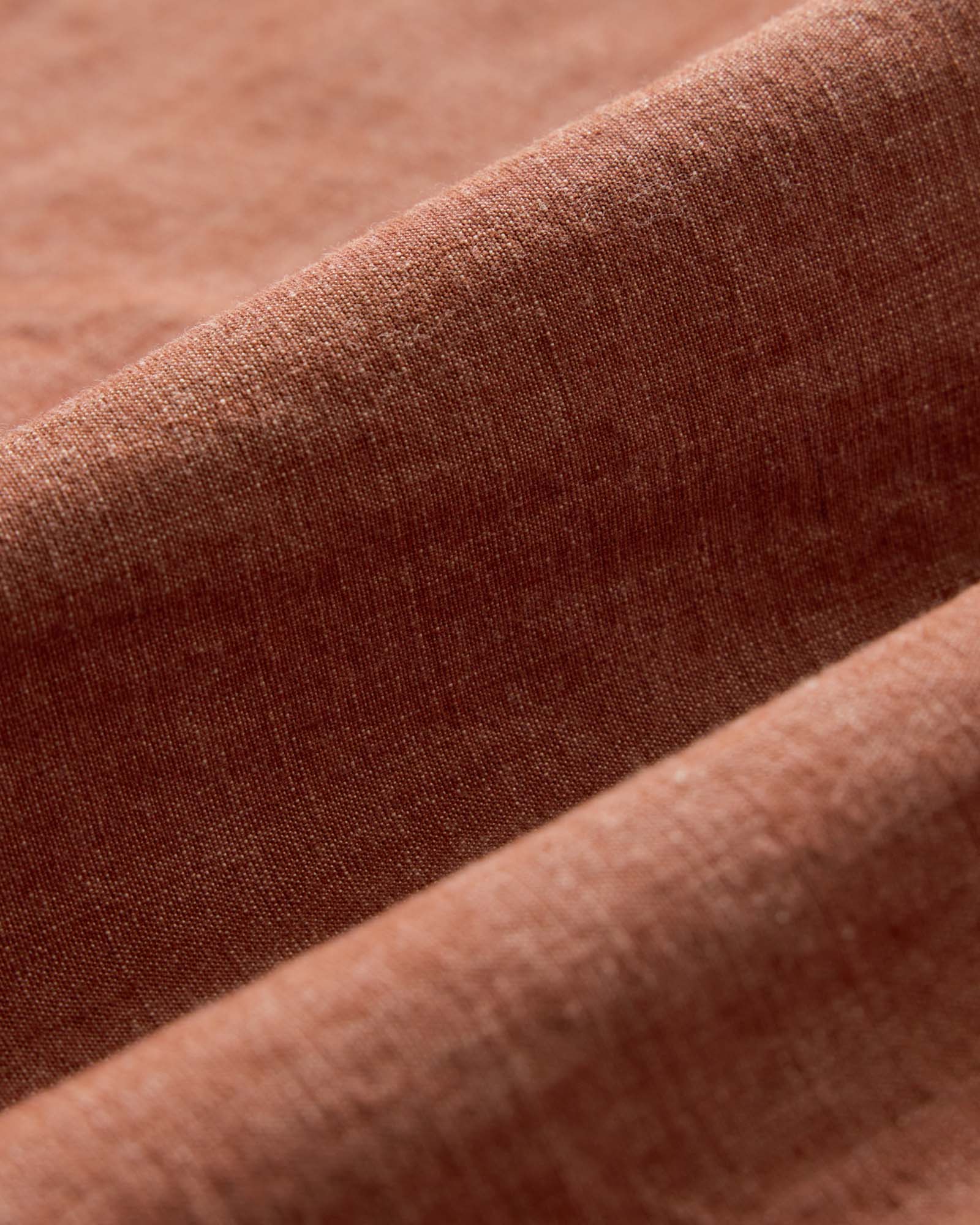material shot of the fabric on The Breakwater Short in Brick Chambray, Bottoms by Taylor Stitch