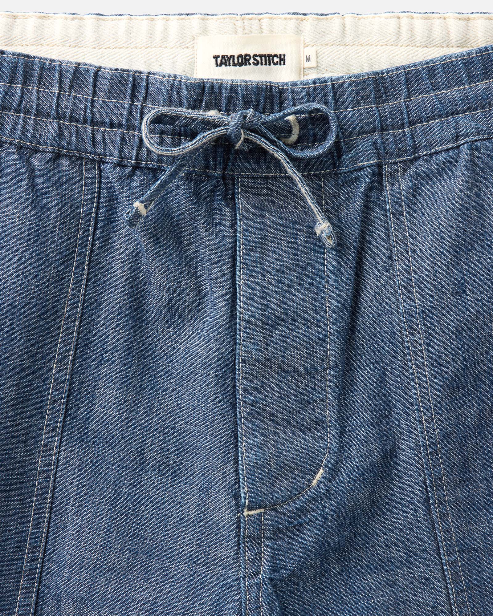material shot of the waistband on The Breakwater Short in Washed Indigo Chambray, Bottoms by Taylor Stitch