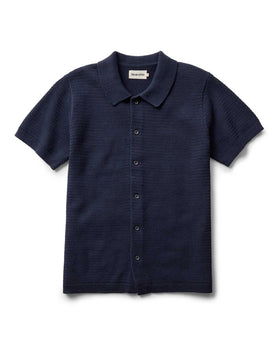flatlay of The Button Down Polo in Dark Navy Crochet, Knits by Taylor Stitch