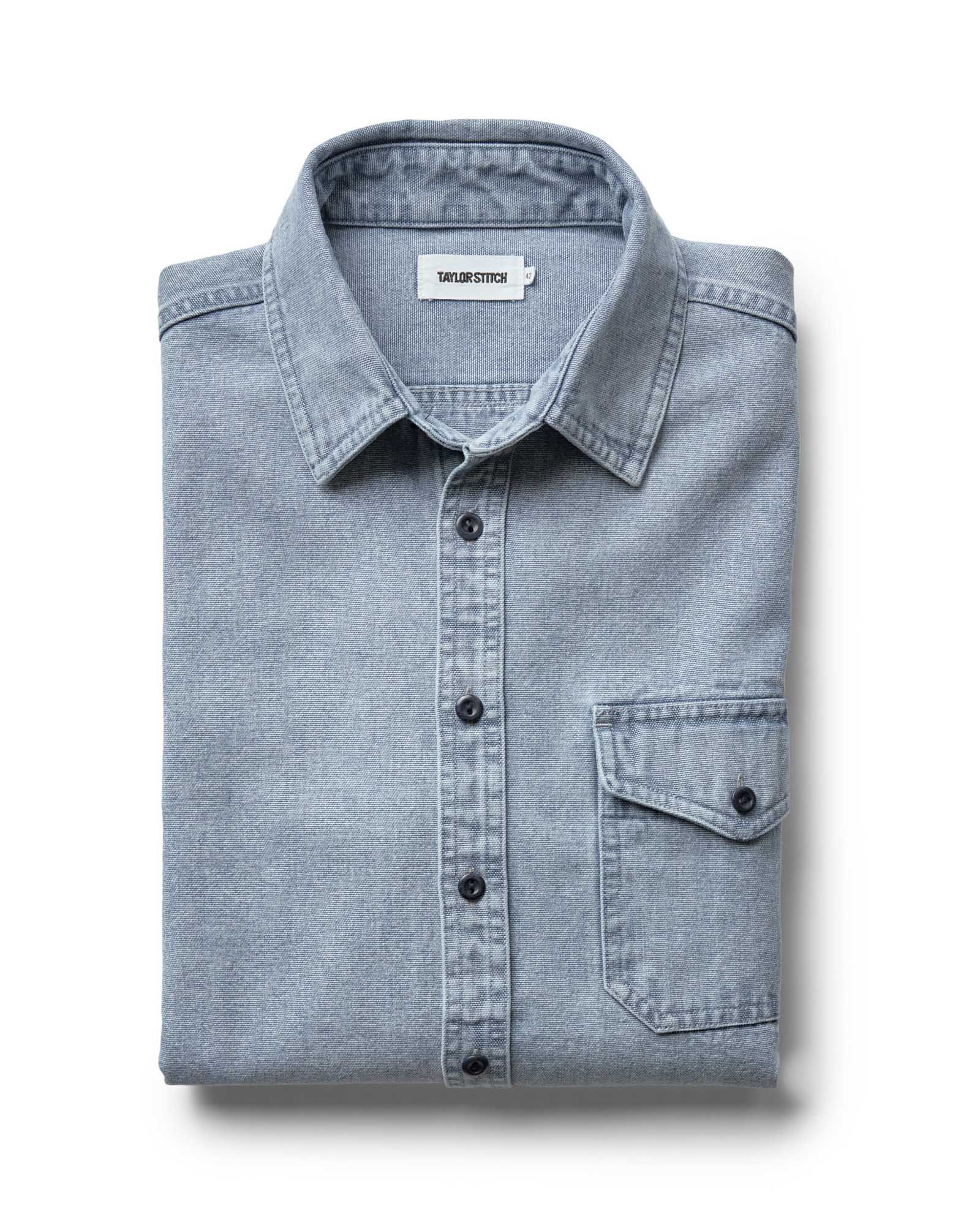 folded flatlay of The Cadet Shirt in Washed Indigo Oxford, Wovens by Taylor Stitch