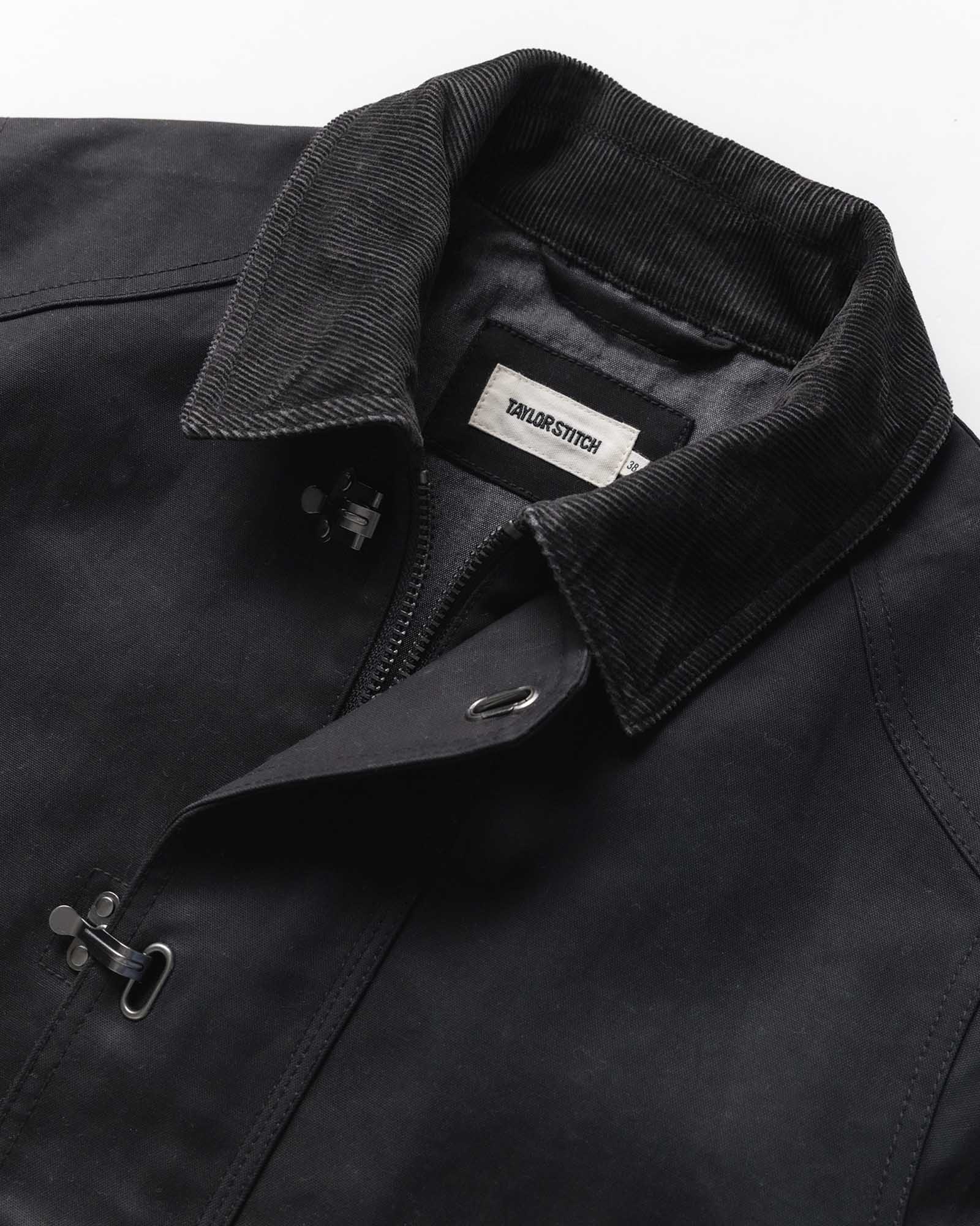 material shot of the collar on The Cinder Jacket in Coal Dry Wax, Outerwear by Taylor Stitch