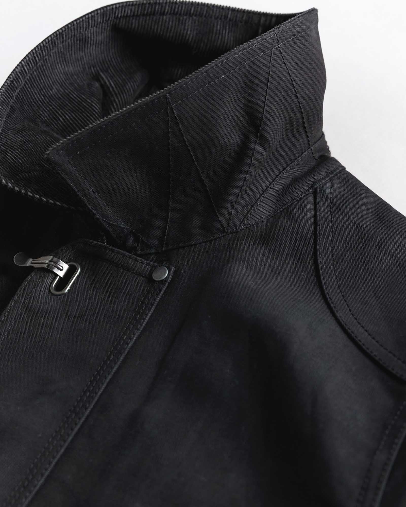 material shot of the underside of the collar on The Cinder Jacket in Coal Dry Wax, Outerwear by Taylor Stitch