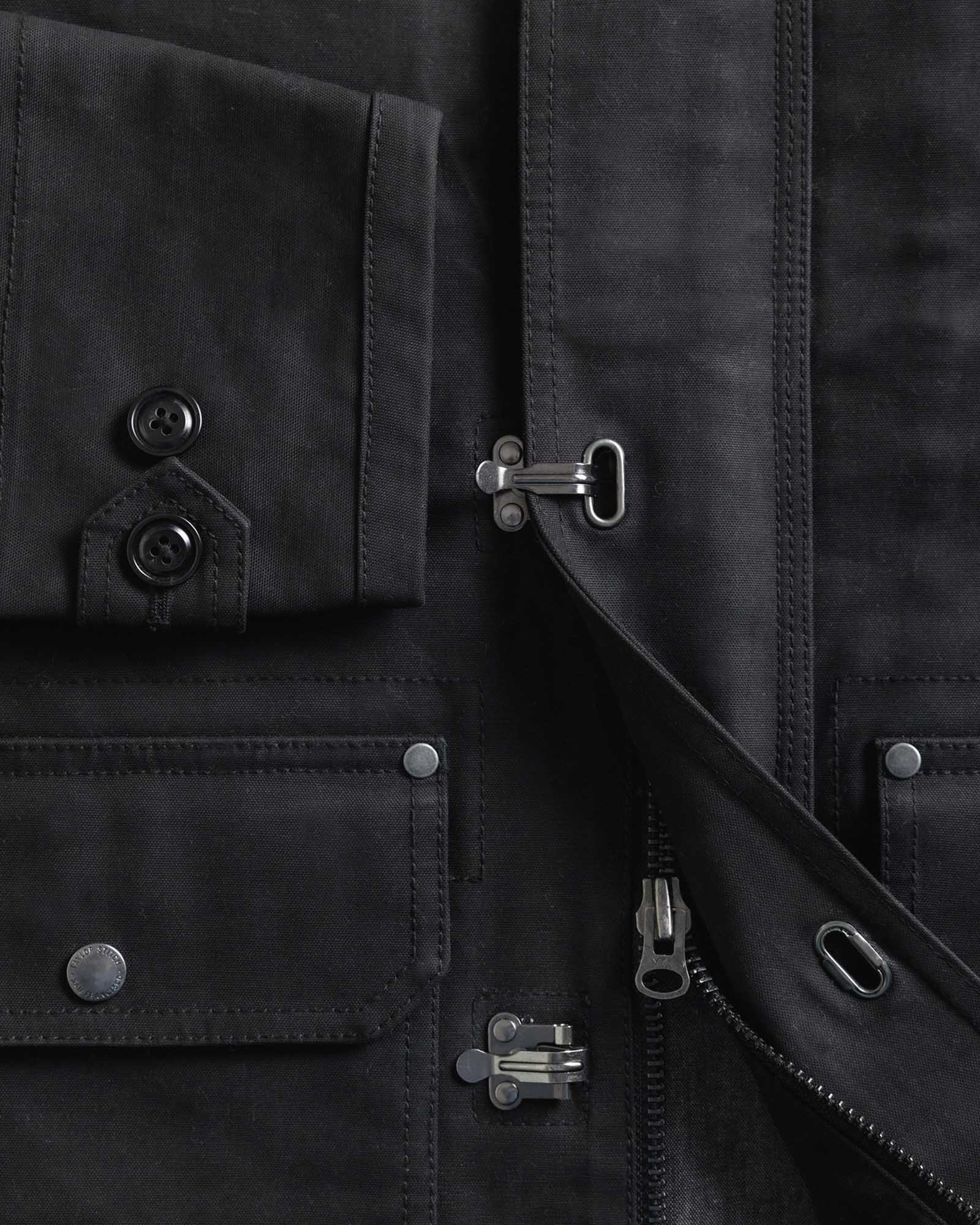 material shot of the zipper on The Cinder Jacket in Coal Dry Wax, Outerwear by Taylor Stitch