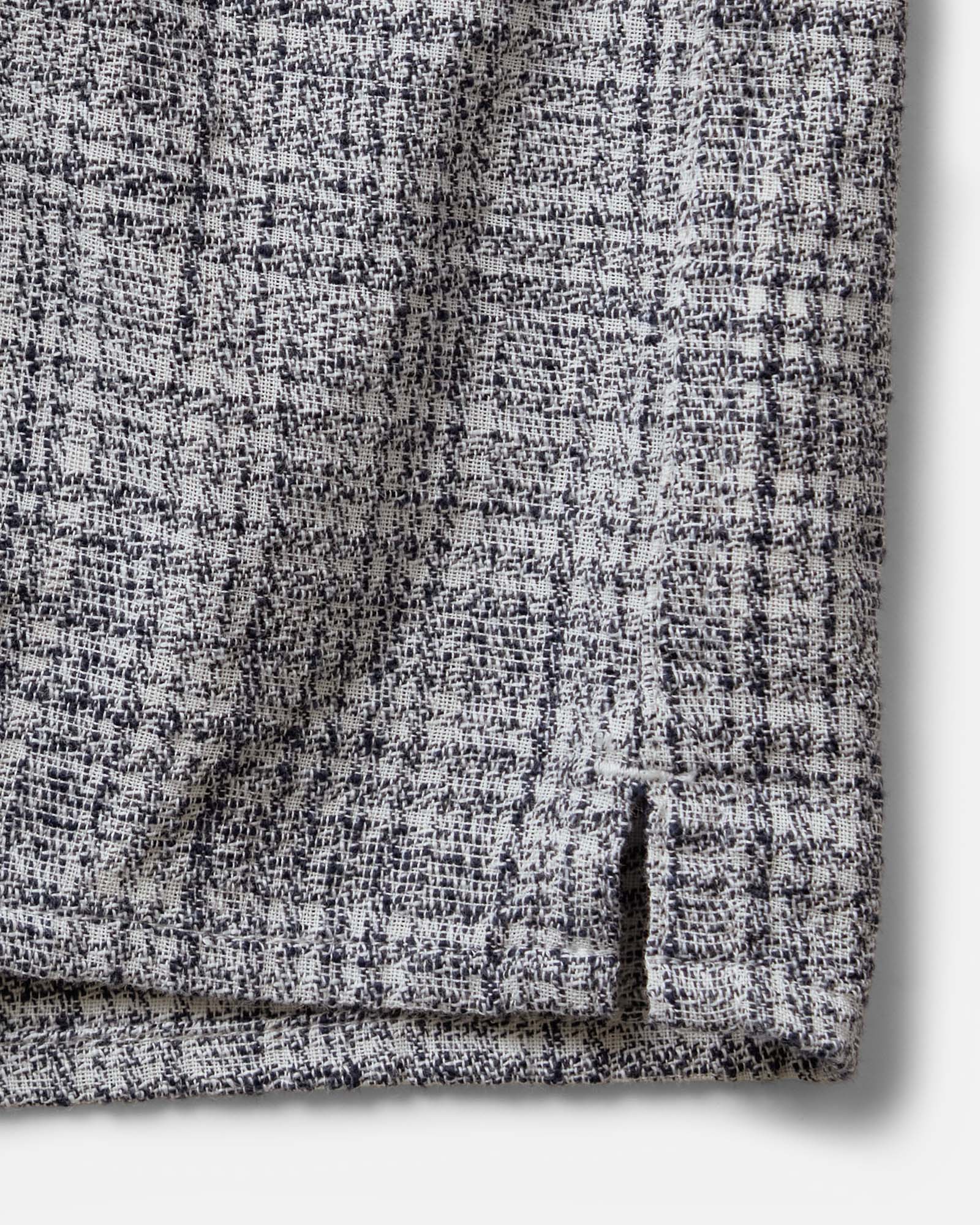 material shot of the hem on The Conrad Shirt in Cloud Cover Dobby, Wovens by Taylor Stitch