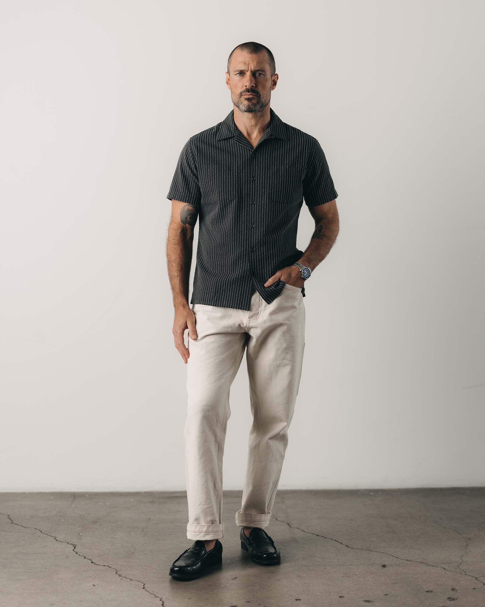 fit model posing in The Conrad Shirt in Pickstitch Stripe Dobby, Wovens by Taylor Stitch