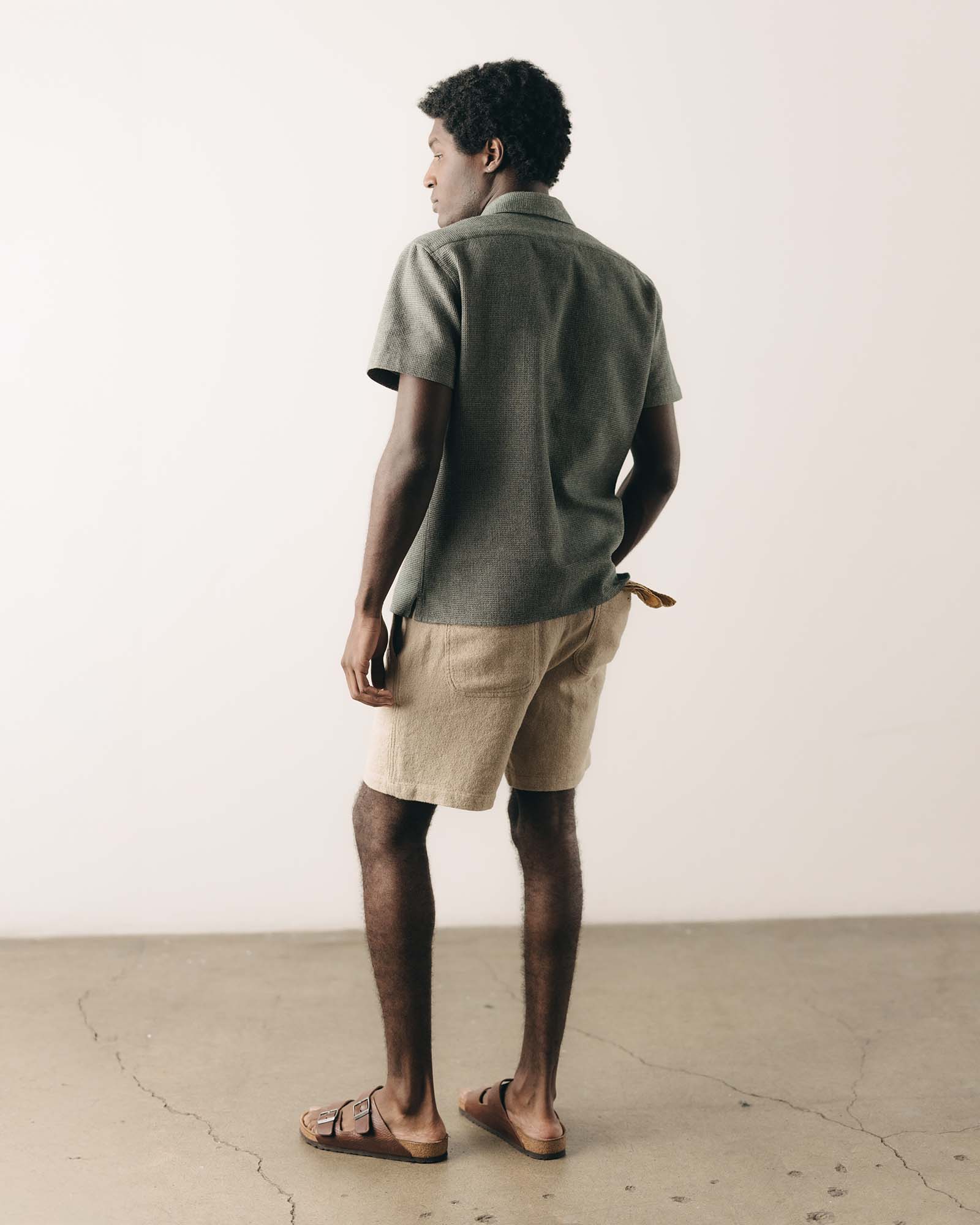 fit model posing in The Conrad Shirt in Deep Sea Twist, Wovens by Taylor Stitch