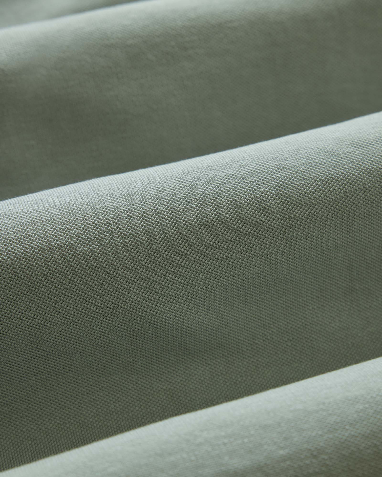 material shot of the fabric on The Cotton Hemp Polo in Surf Green Pique, Knits by Taylor Stitch