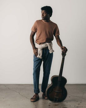 fit model posing in The Democratic Jean in Japanese Washed Indigo Sashiko, Bottoms by Taylor Stitch