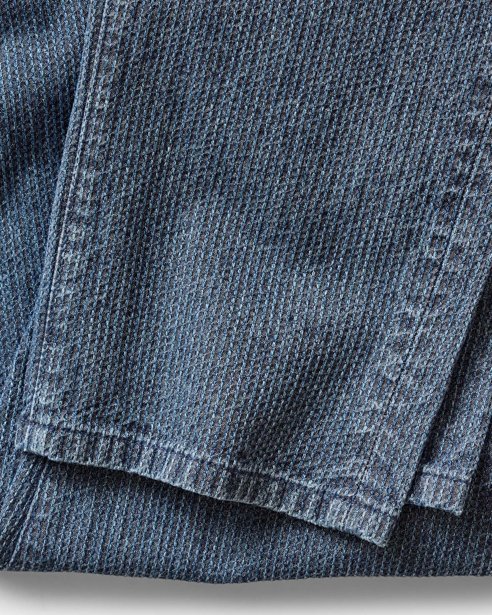 material shot of the hem on The Democratic Jean in Japanese Washed Indigo Sashiko, Bottoms by Taylor Stitch