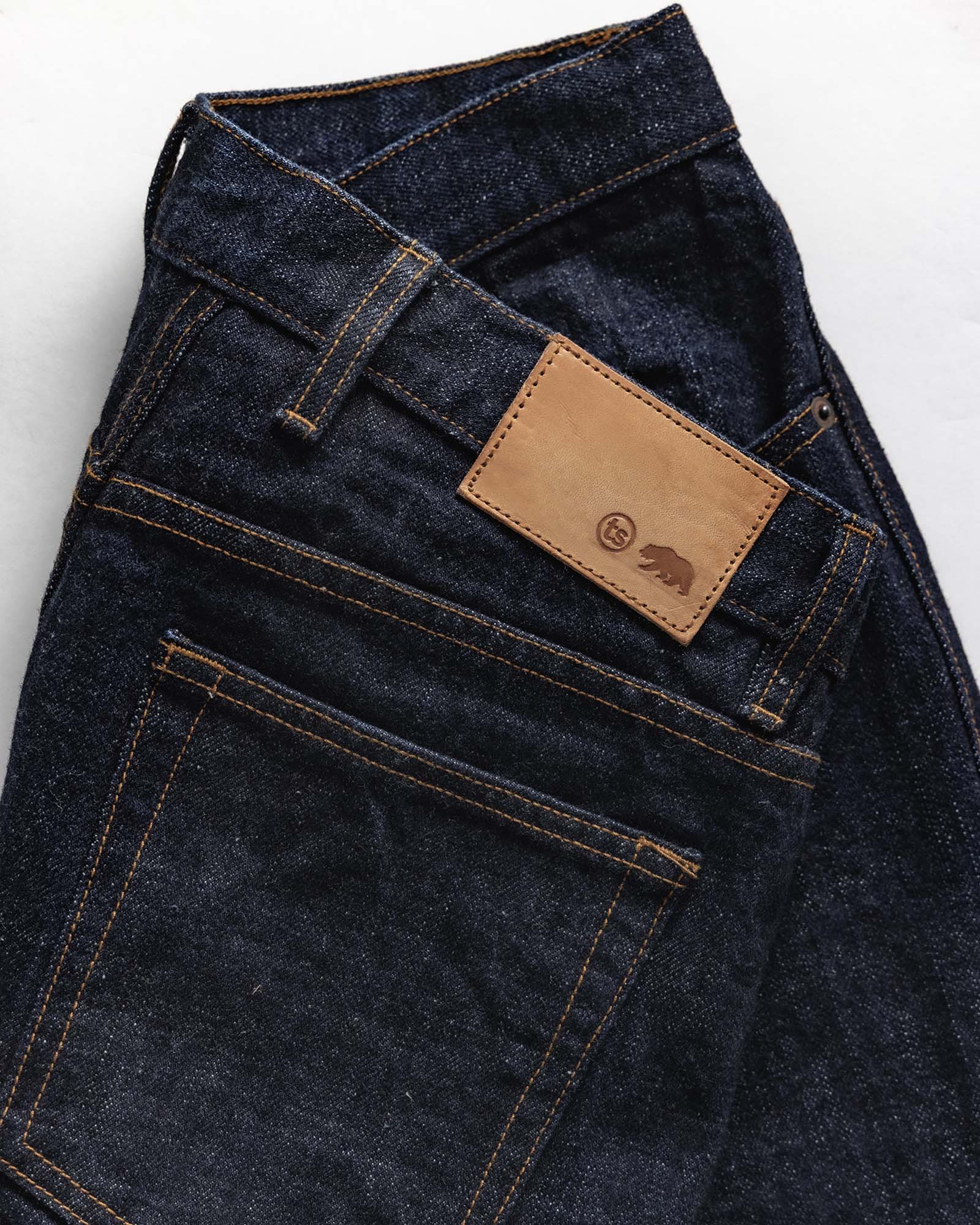 material shot of the waistband on The Democratic Jean in Rinsed Yoshiwa Selvedge, Bottoms by Taylor Stitch