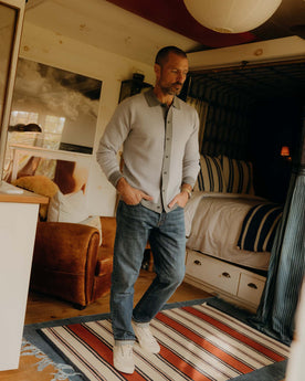 fit model showing off bottom hem on The Democratic Jean in Mid Wash Organic Selvedge, Bottoms by Taylor Stitch