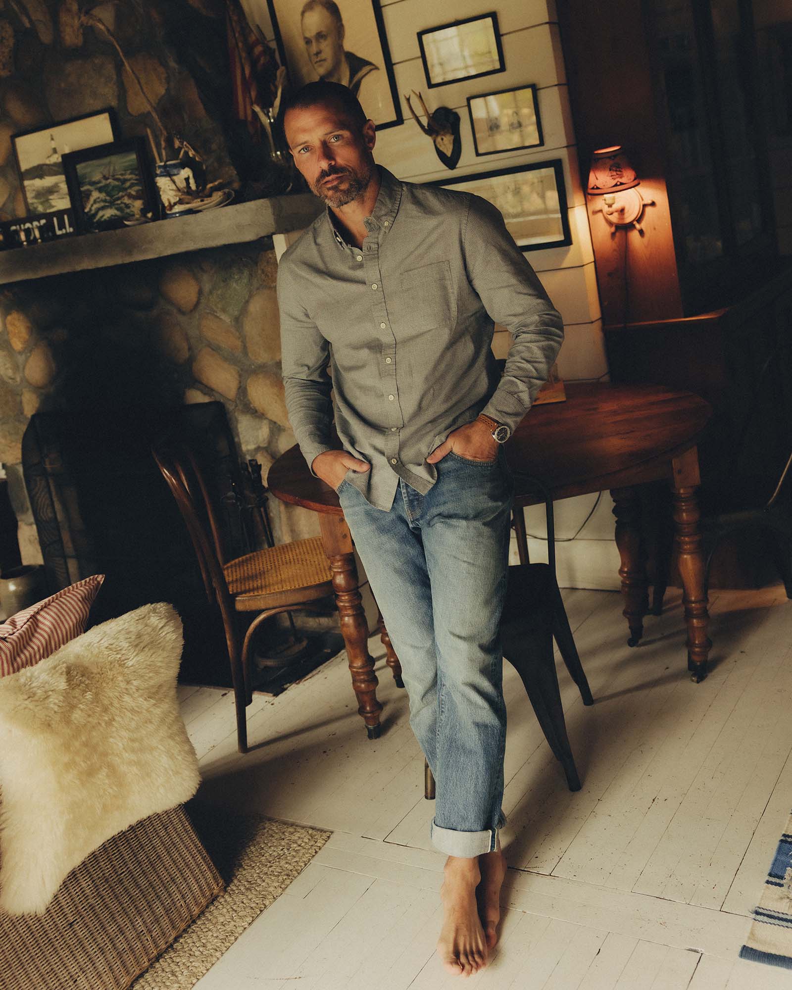 fit model posing in The Democratic Jean in Light Wash Organic Selvedge, Bottoms by Taylor Stitch