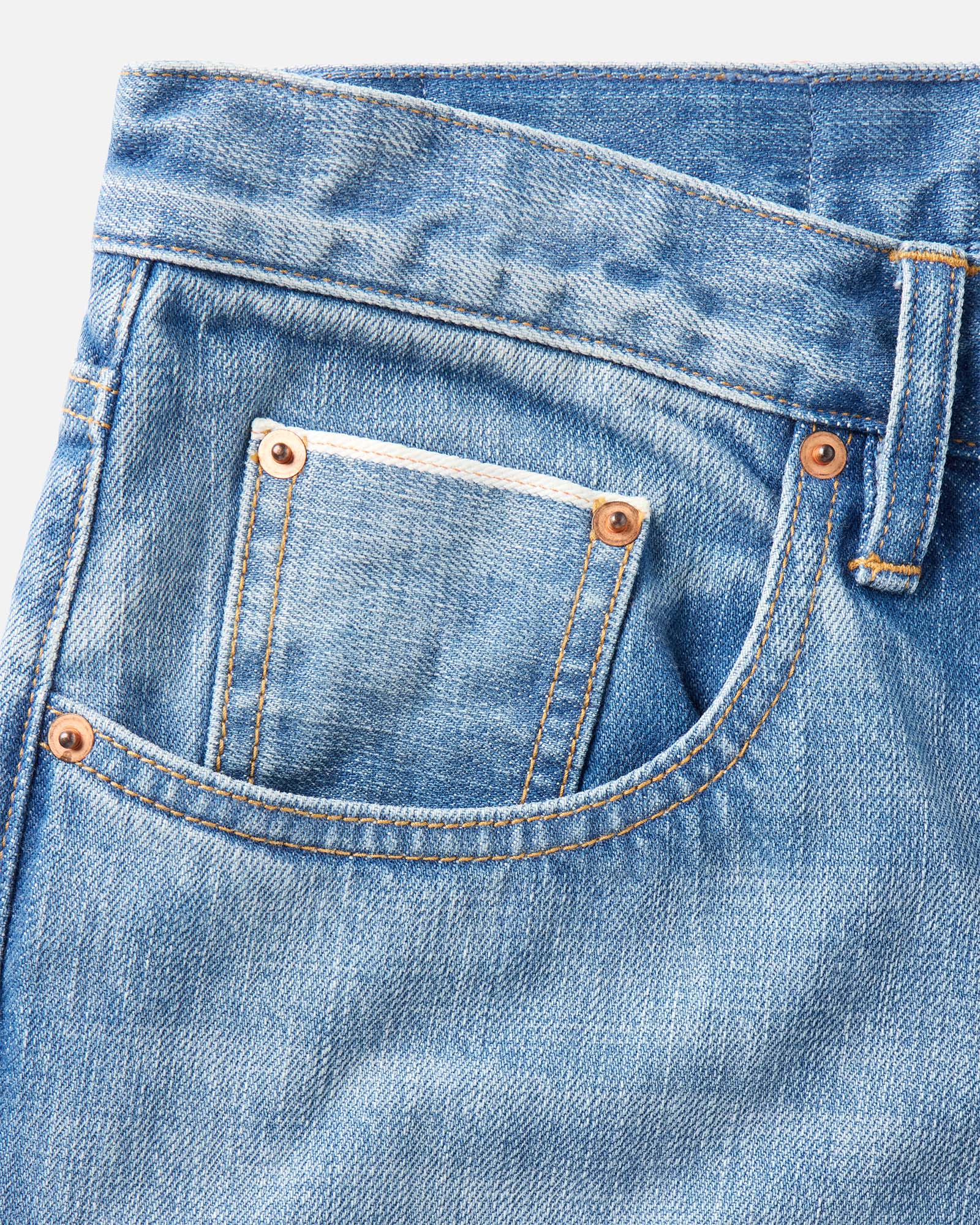 material shot of the pocket on The Democratic Jean in Light Wash Organic Selvedge, Bottoms by Taylor Stitch