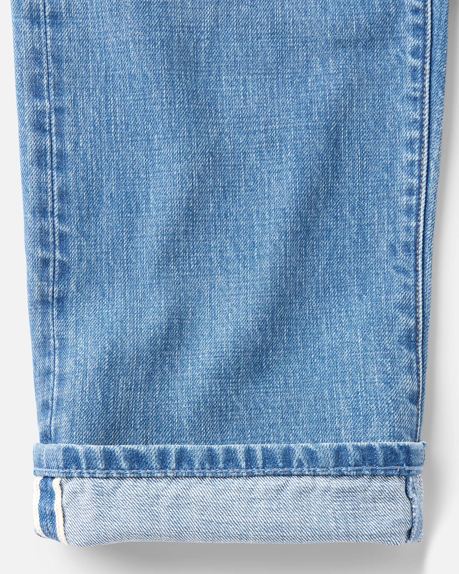 material shot of the cuff on The Democratic Jean in Light Wash Organic Selvedge, Bottoms by Taylor Stitch