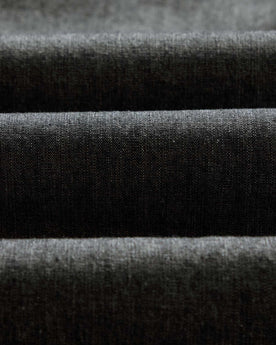 material shot of the fabric on The Easy Pant in Black Indigo Chambray, Bottoms by Taylor Stitch