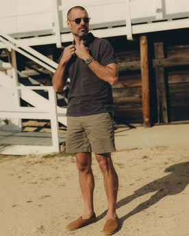 fit model posing in The Foundation Short in Organic Smoked Olive, Bottoms by Taylor Stitch