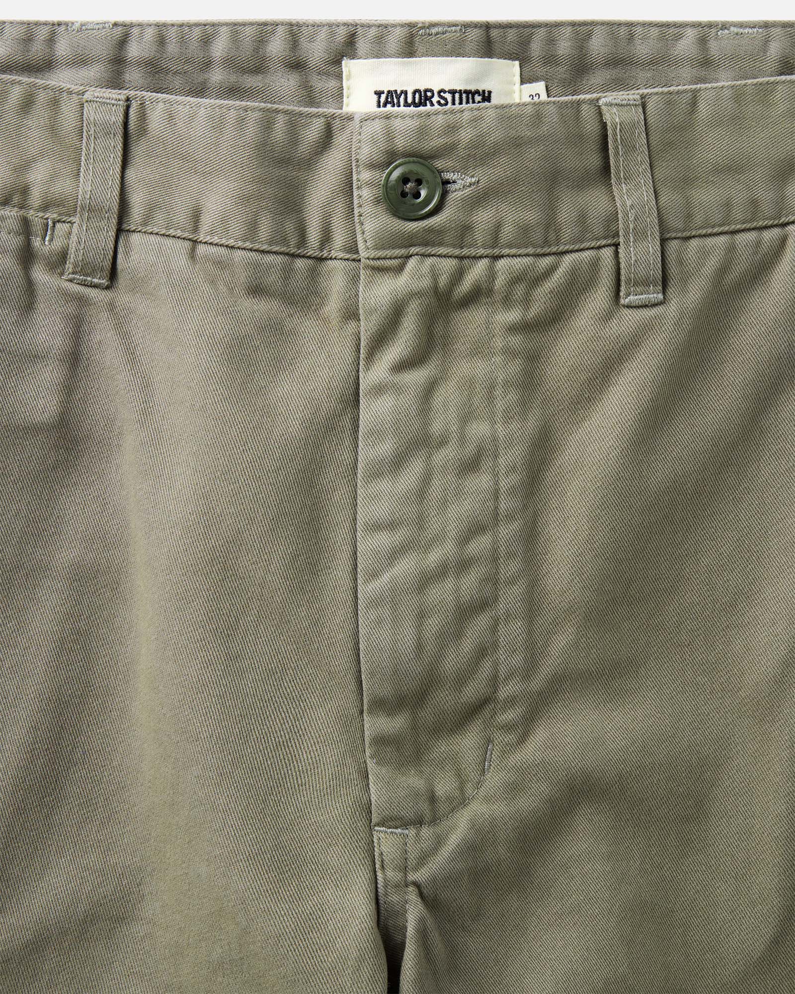 material shot of the waistband on The Foundation Short in Organic Smoked Olive, Bottoms by Taylor Stitch