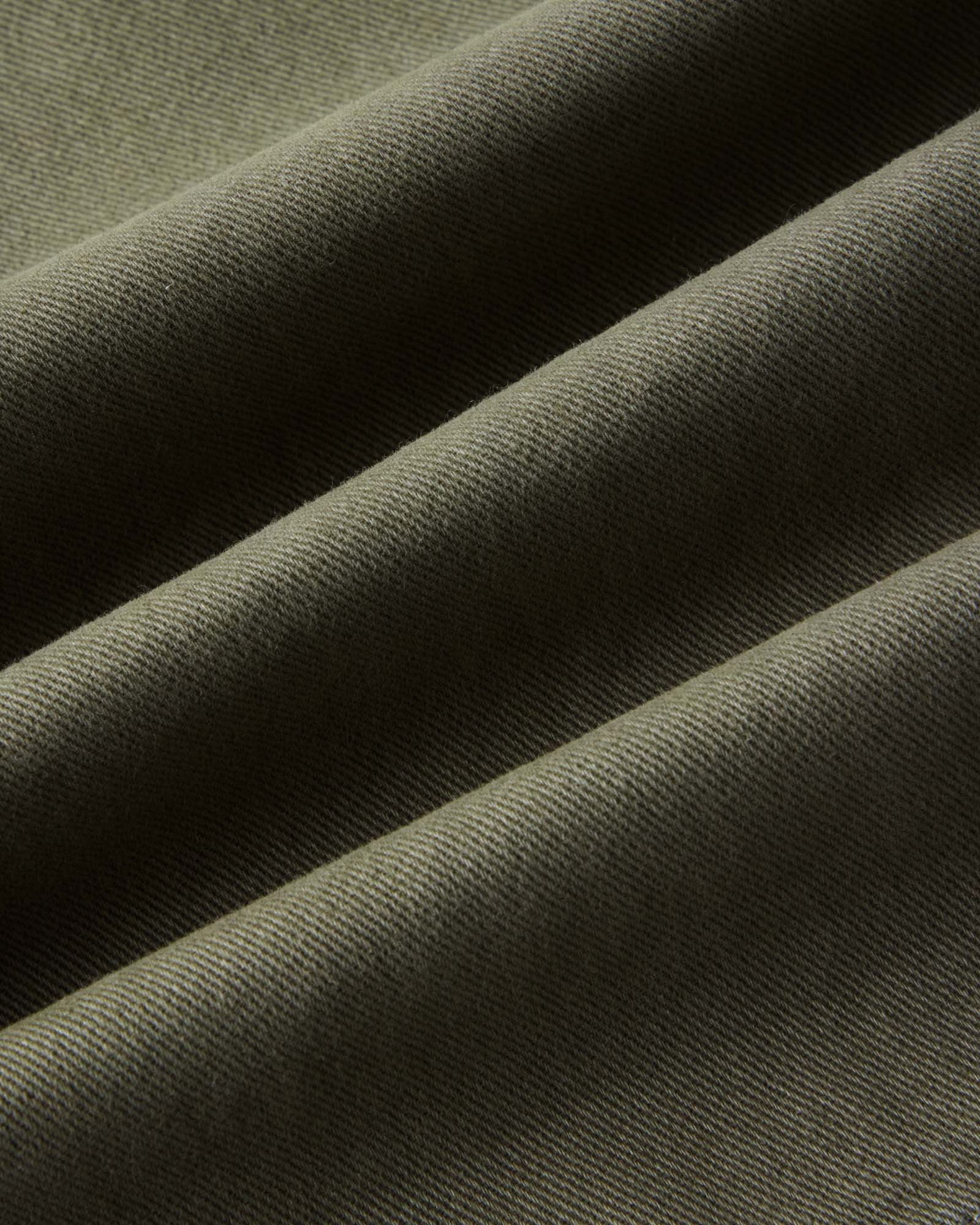 material shot of the fabric on The Foundation Short in Organic Smoked Olive, Bottoms by Taylor Stitch