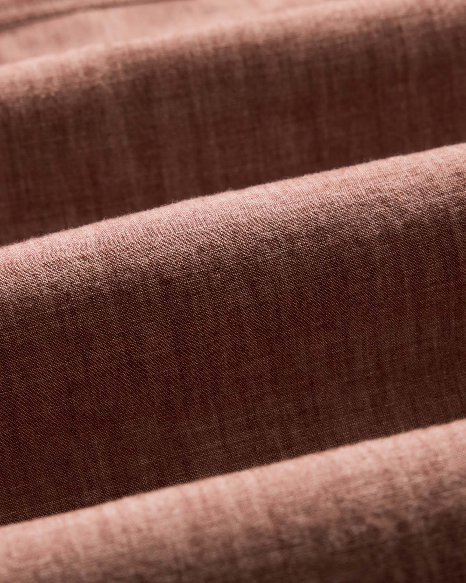 material shot of the fabric on The Foundry Shirt in Brick Chambray, Wovens by Taylor Stitch