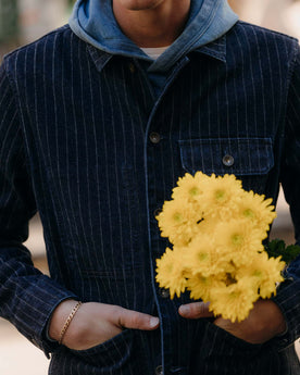 fit model showing off The Fremont Jacket in Rinsed Indigo Dobby Denim, Outerwear by Taylor Stitch